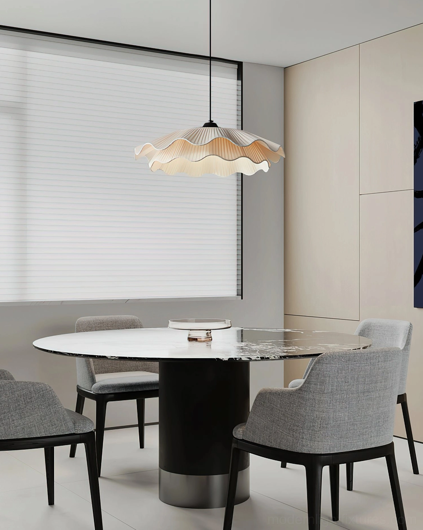 Artistic ripple pendant fixture showing light diffusion through pleated white fabric design