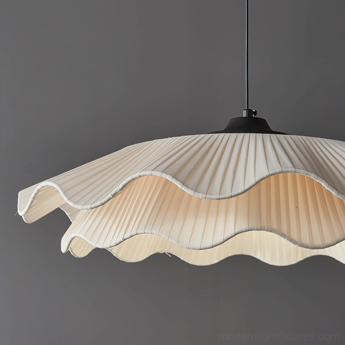 Hardwired rippled pendant light fixture showing elegant installation in contemporary residence