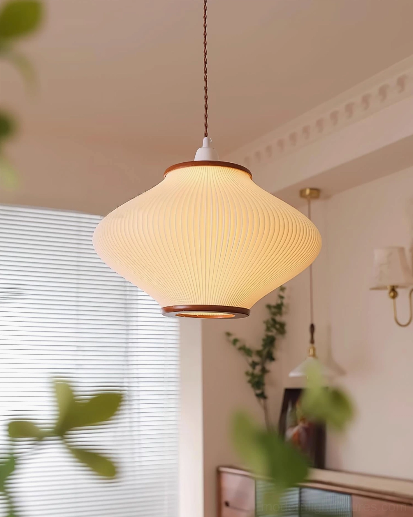 White ribbed acrylic pendant lamp in contemporary minimalist interior, overhead perspective view