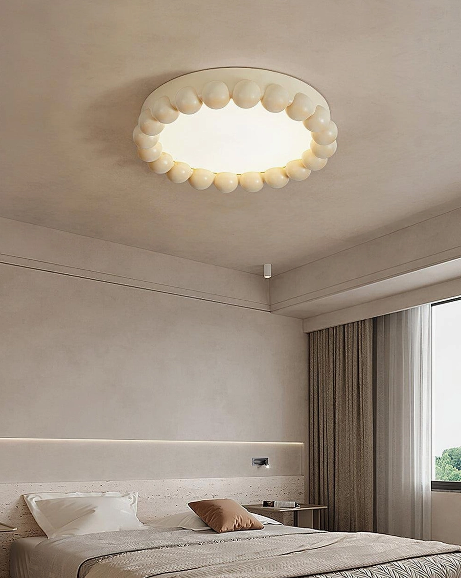 Beaded ceiling light fixture in white finish installed in contemporary home interior