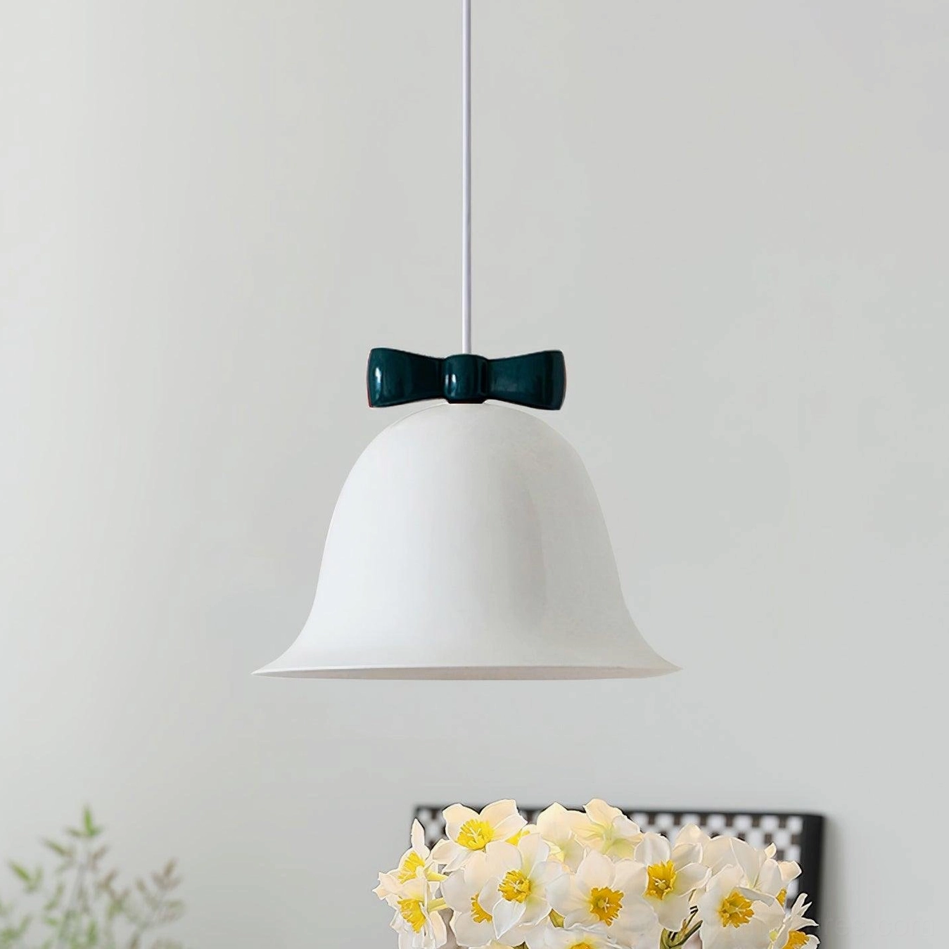 White and blue two-tone ceramic bell-shaped pendant light with bow accent detail