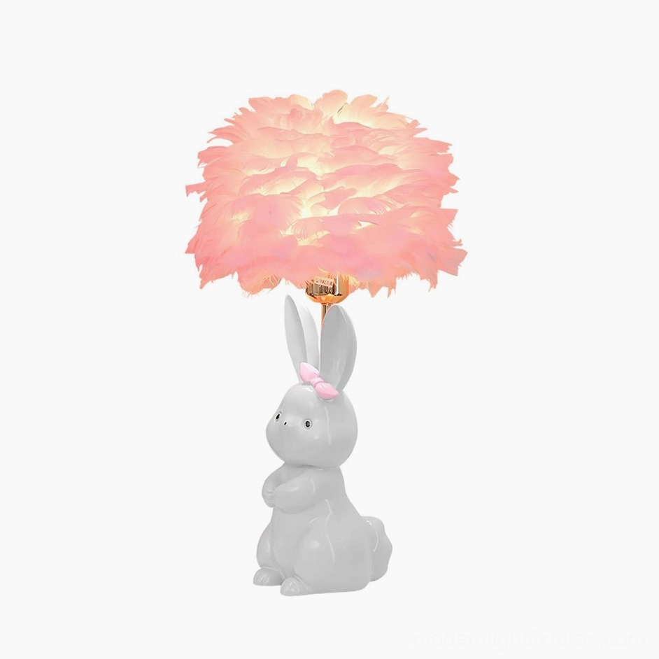 White ceramic bunny lamp with matching white feather shade - soft illumination for kids bedroom