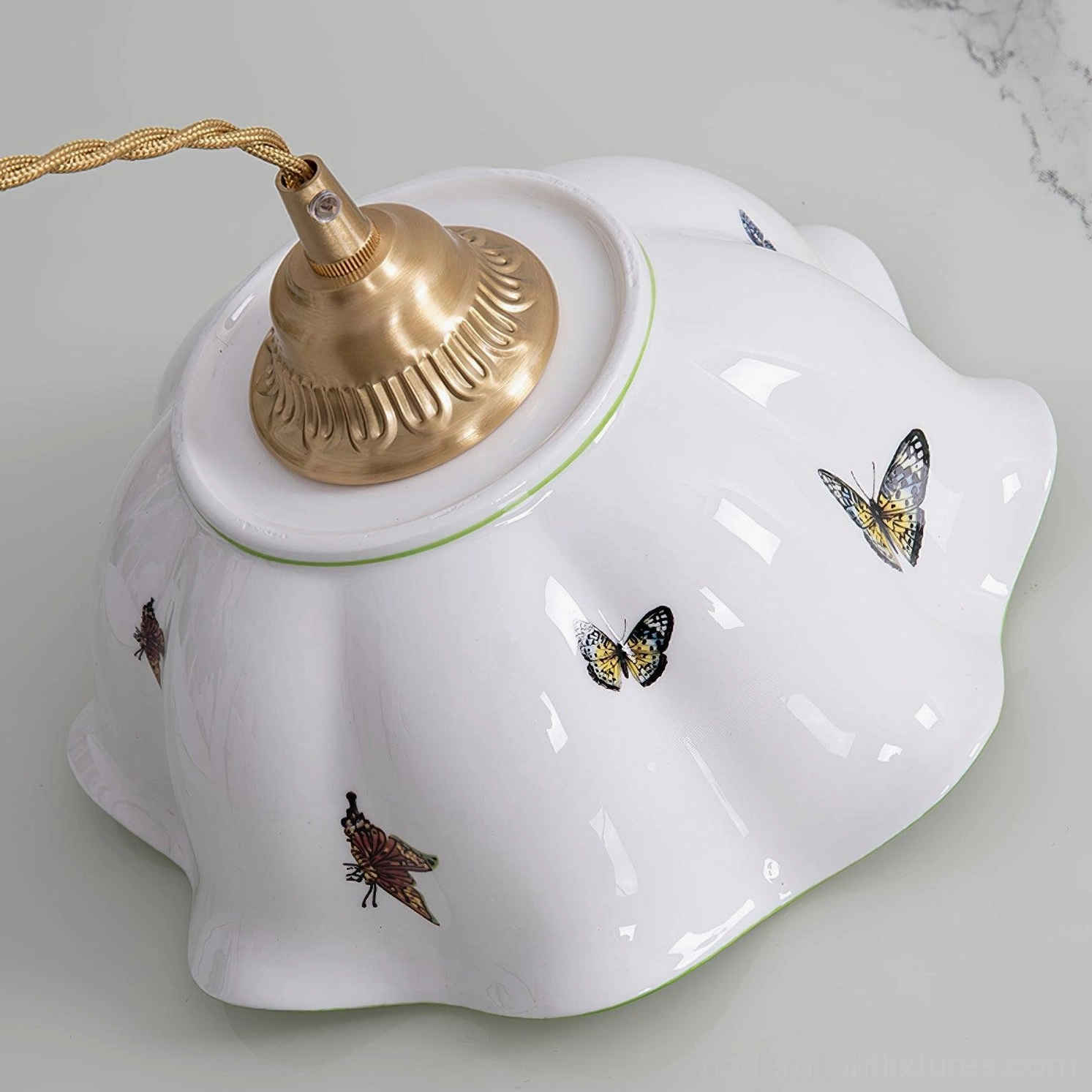 White ceramic pendant lamp with delicate butterfly prints and scalloped edge design