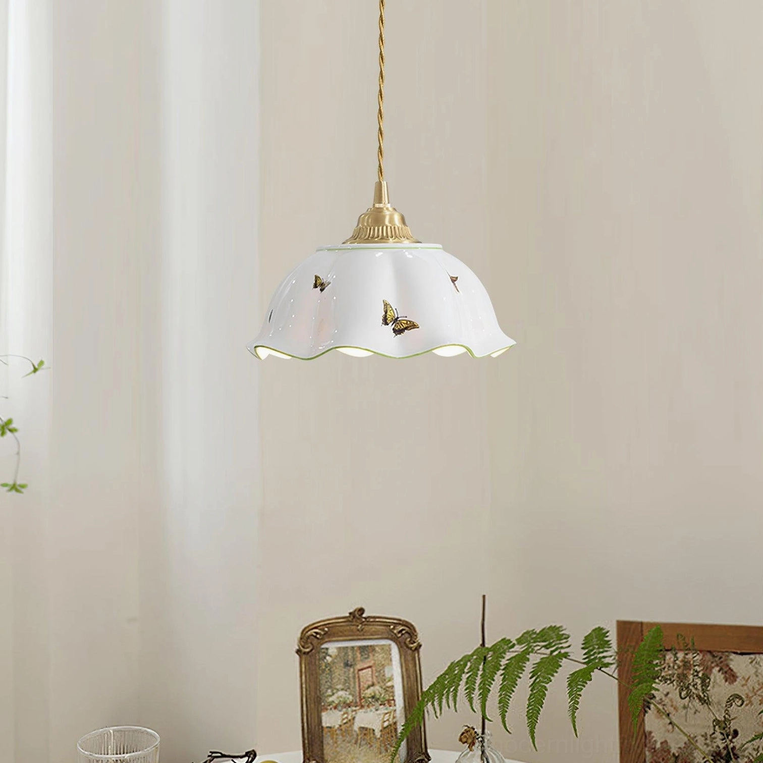 Ceramic butterfly pendant lamp close-up detail showing handcrafted white ceramic shade