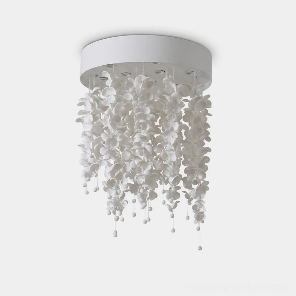 Modern white ceramic petal chandelier with hand-crafted flower petals suspended from circular base, front view against white background