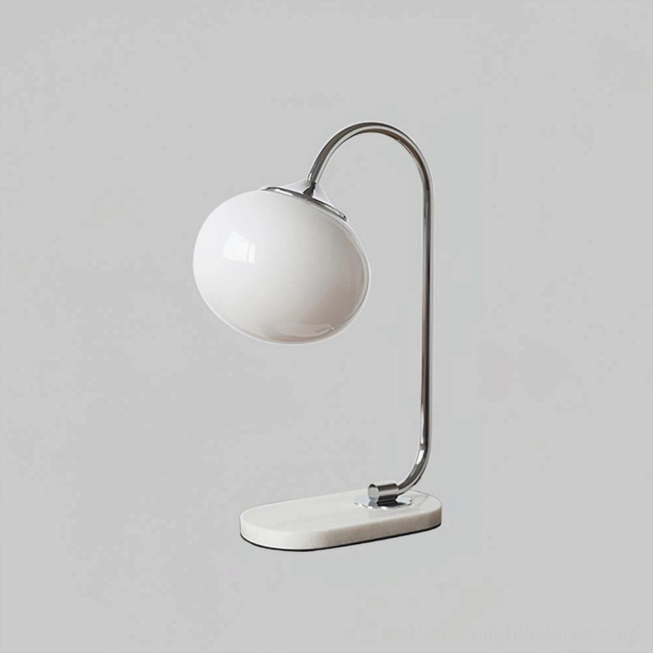 White chrome globe table lamp with spherical glass shade and marble base elegant fixture