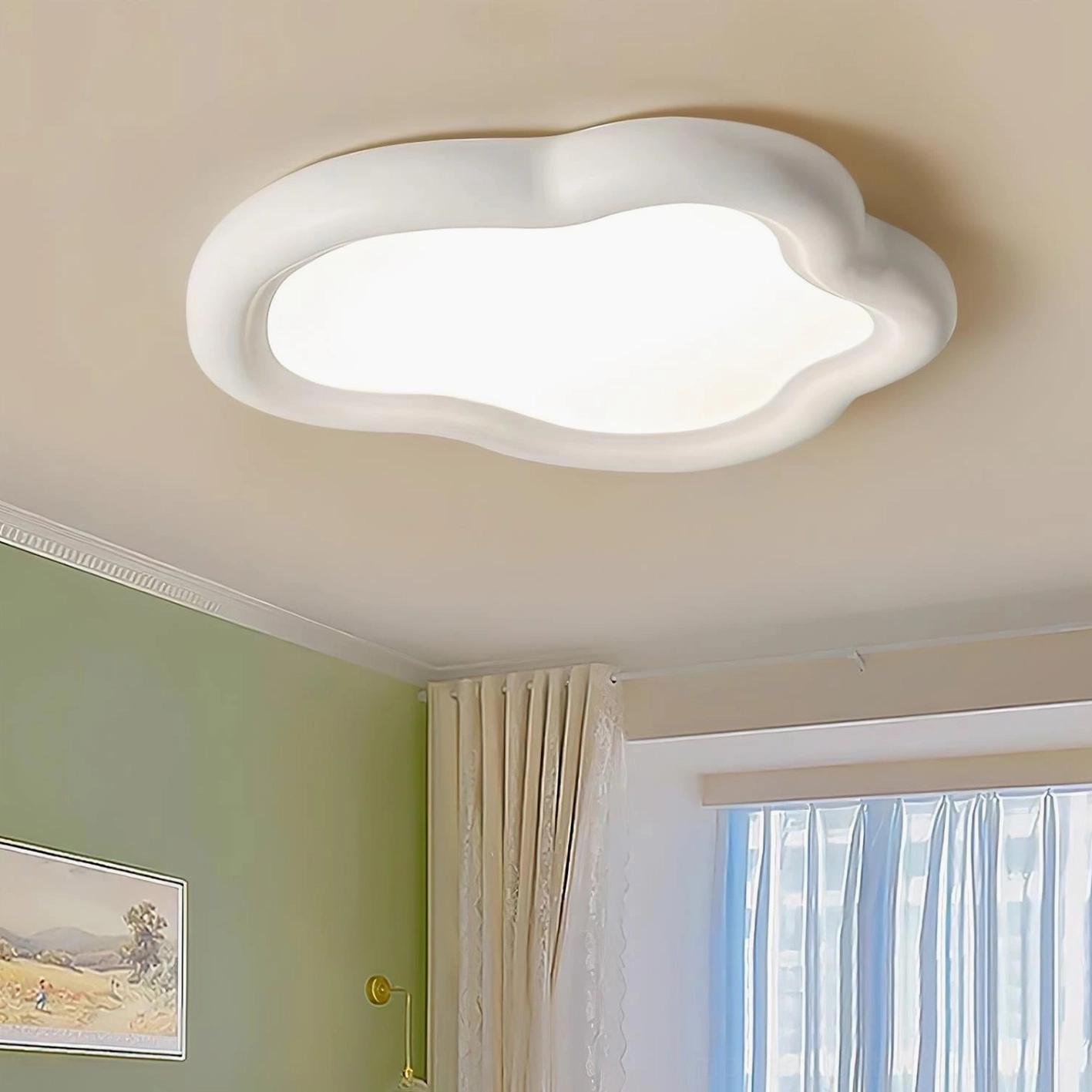 White matte frame cloud flush mount ceiling light mounted in bedroom with green wall decor and natural lighting