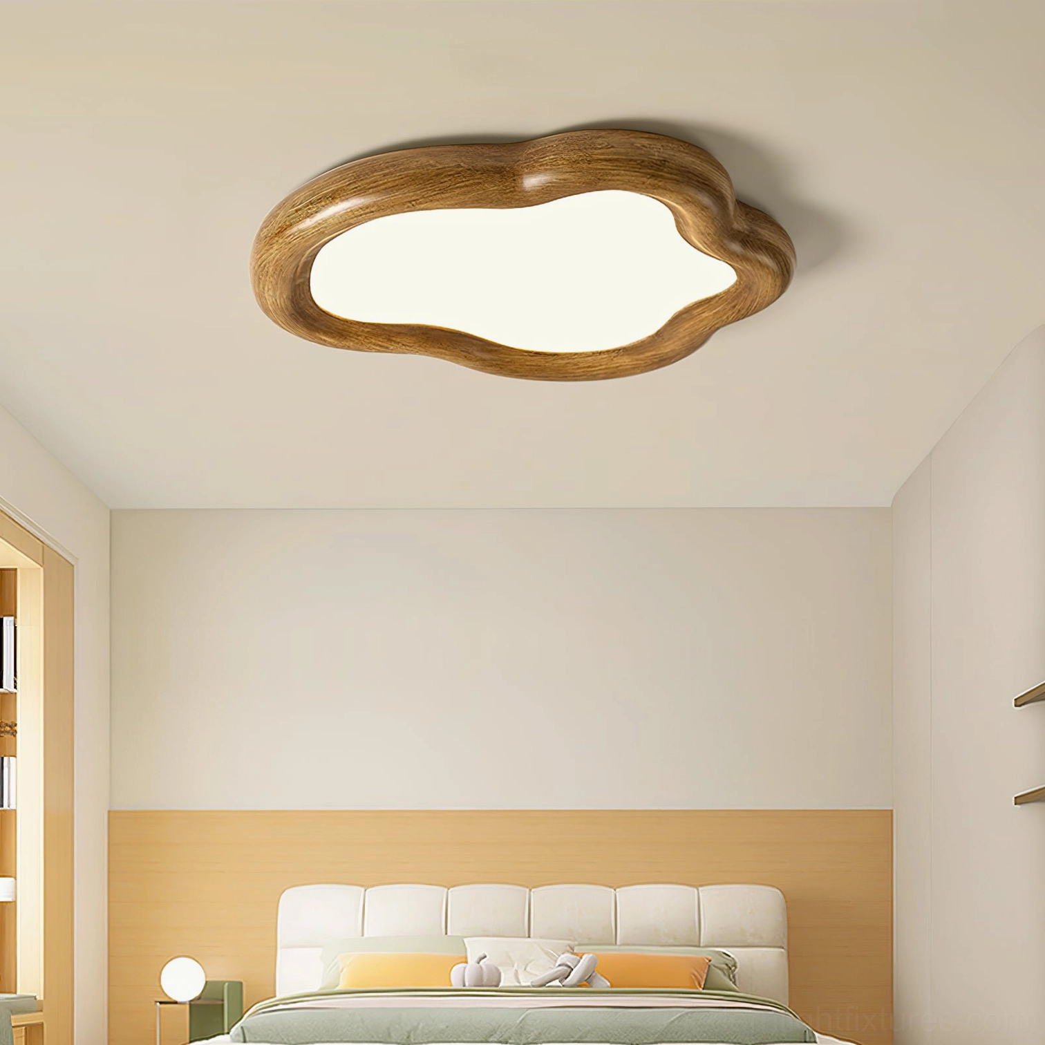 White cloud-shaped ceiling light fixture mounted on bedroom ceiling with warm home interior decor