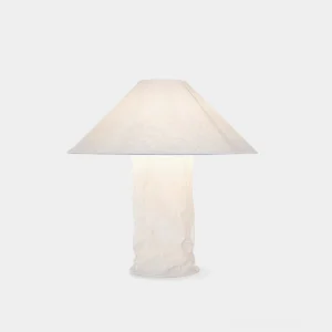Artisan crinkled paper modern table lamp with white finish, front view on minimalist background