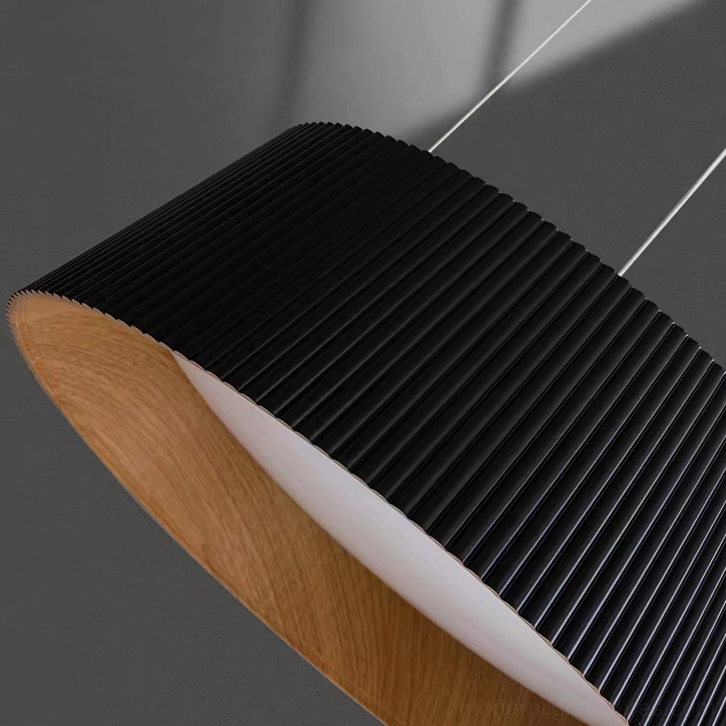 White Delta pleated pendant light fixture showing construction quality and modern design details