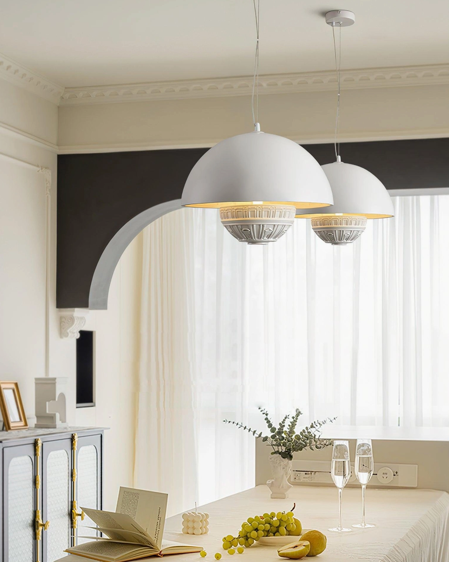 Two white dome pendant lamps in open-plan kitchen dining area French light luxury style