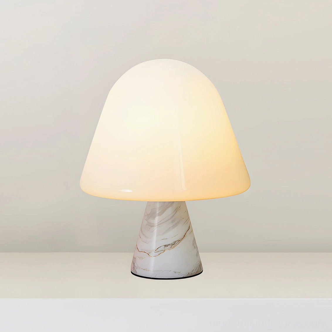 White marble mushroom table lamp variant with white opal glass shade in bright contemporary minimalist room setting