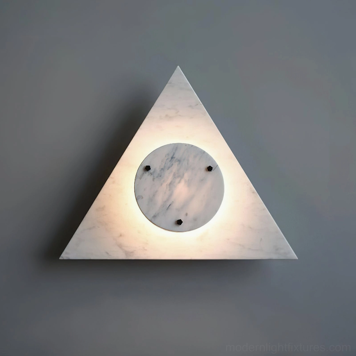 White marble wall sconce with warm integrated LED light on dark gray wall