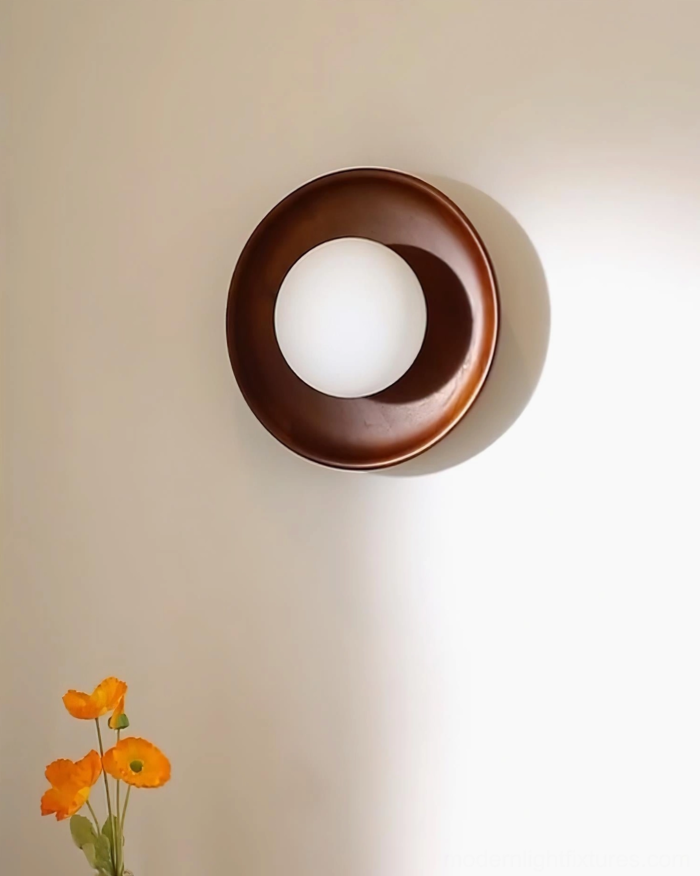 White finish round wall sconce in minimalist modern interior setting