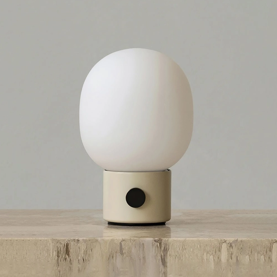 White Monolith table lamp with cylindrical metal base and frosted opal glass shade