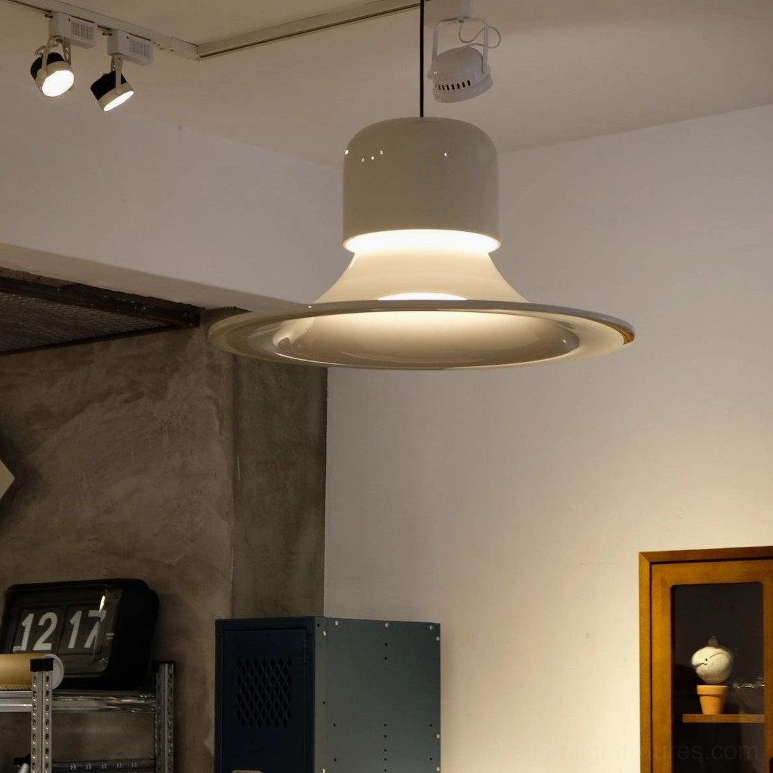 Off-white pendant light with integrated LED viewed from below in retail showroom