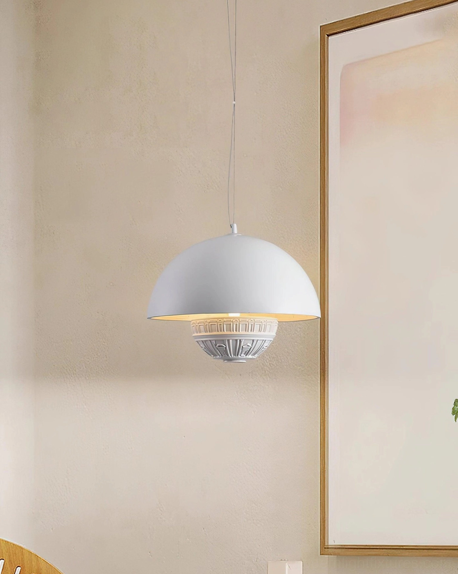 Modern white pendant lamp in hallway with framed wall art warm neutral lighting