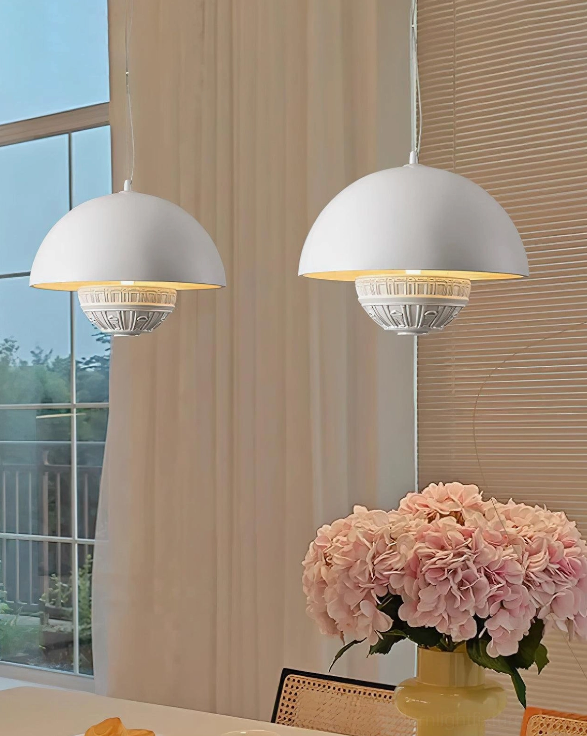 Pair of white dome pendant lights overhead view in contemporary dining space