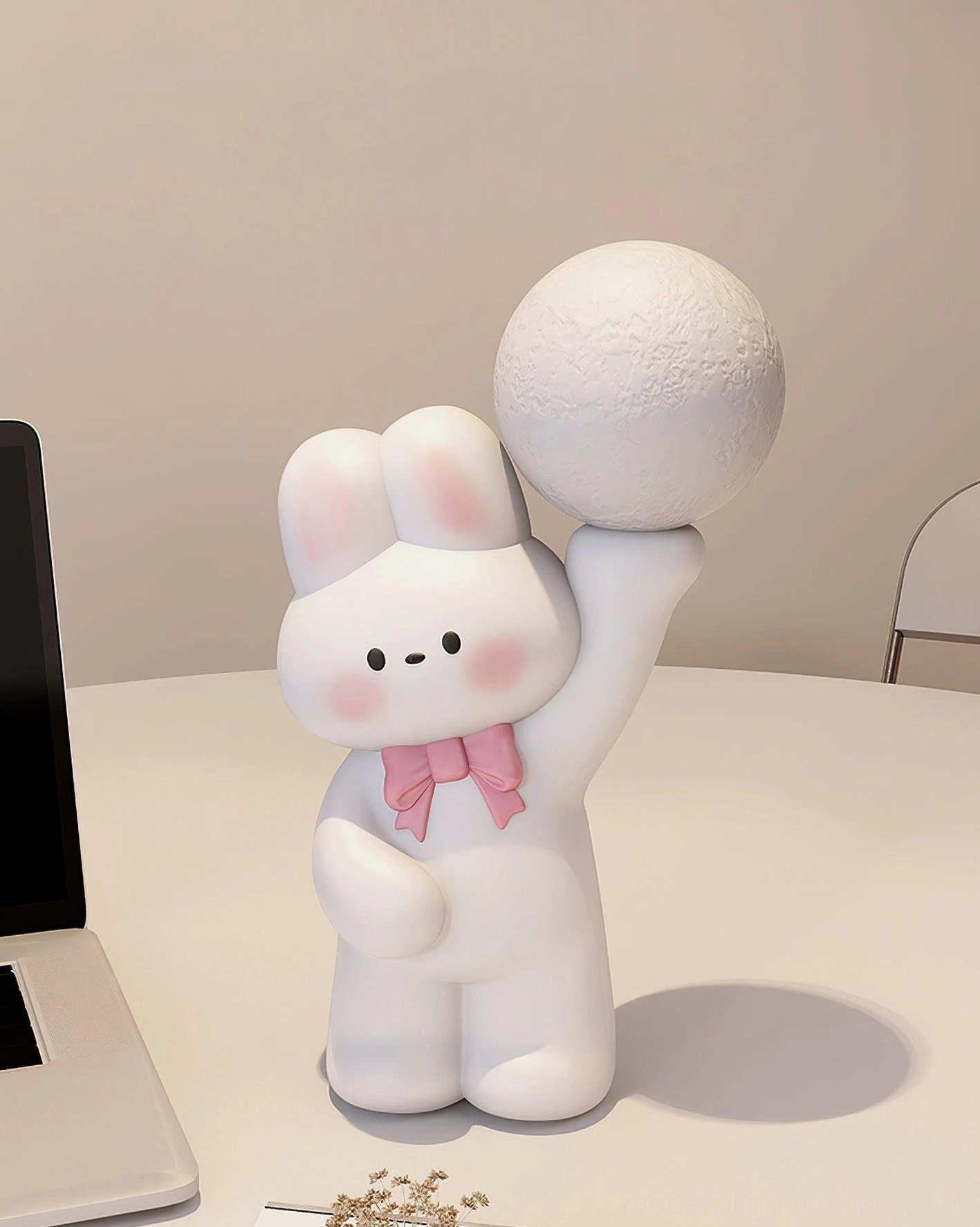 Matte white rabbit lamp with textured moon bulb on minimalist desktop - modern designer table lamp