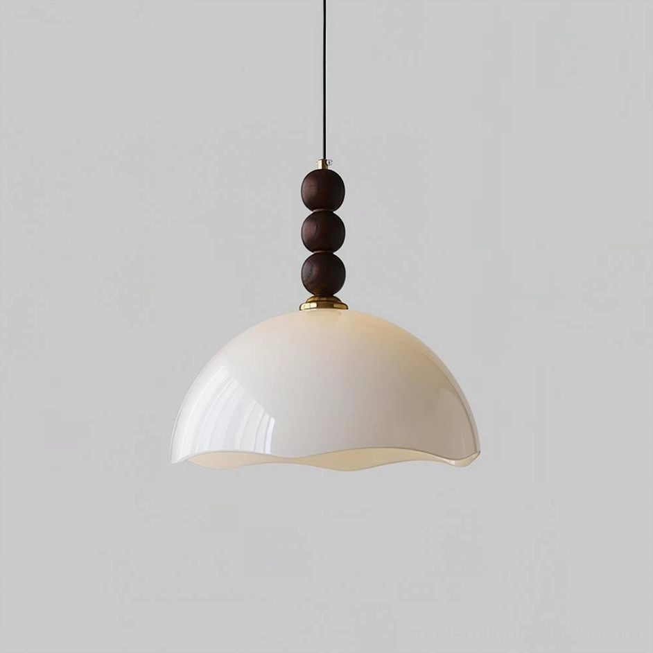 White rippled glass dome pendant light showing delicate wavy-edge texture and diffused downward illumination