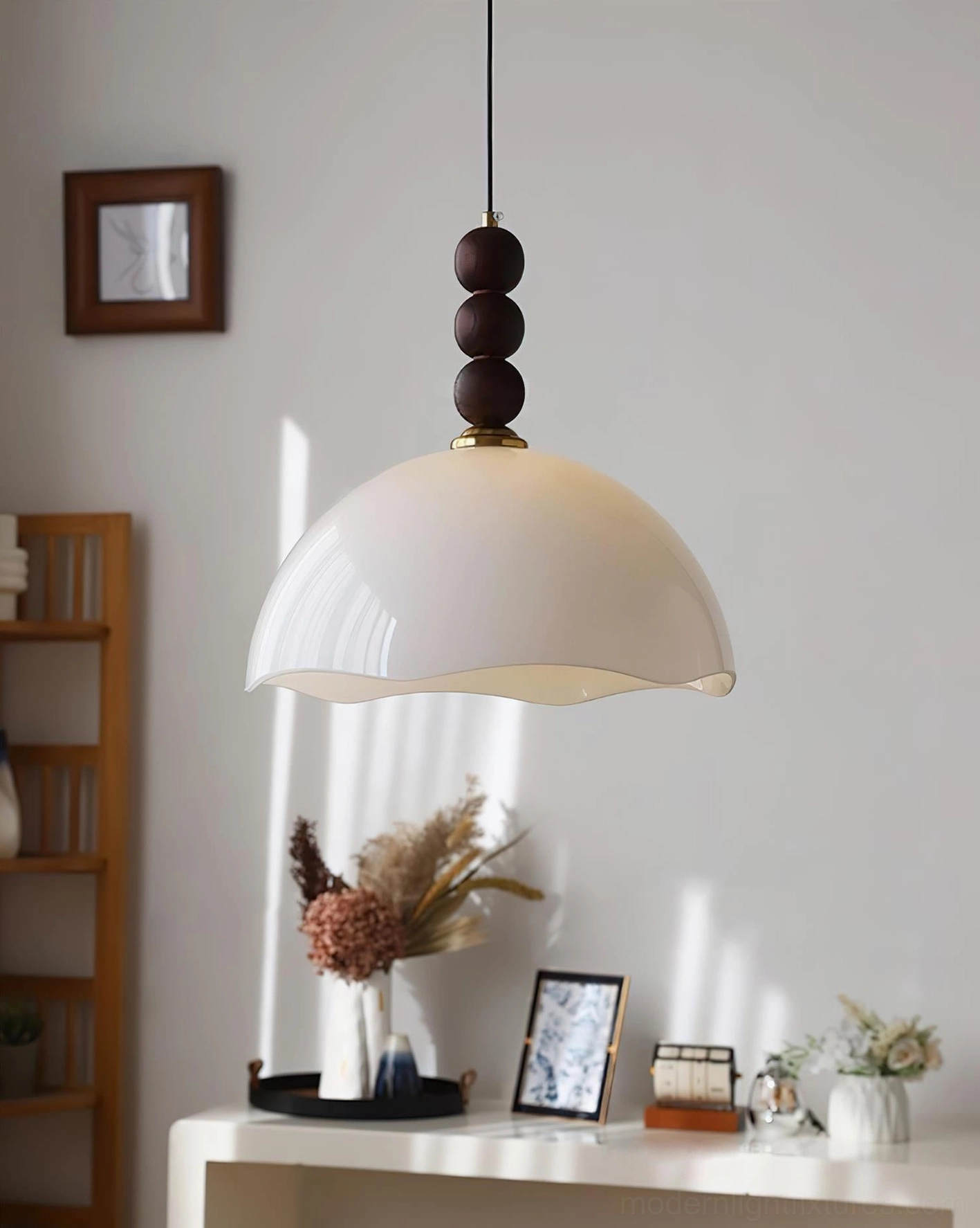 White rippled glass pendant light installation showing adjustable wire suspension and sloped ceiling compatibility