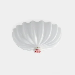 Belle Coquille white shell-shaped ceiling light fixture with pink rose accent detail, front view on plain studio background