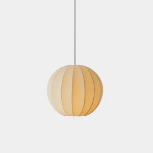 Modern silk pendant light with ribbed globe texture in white finish against neutral studio background