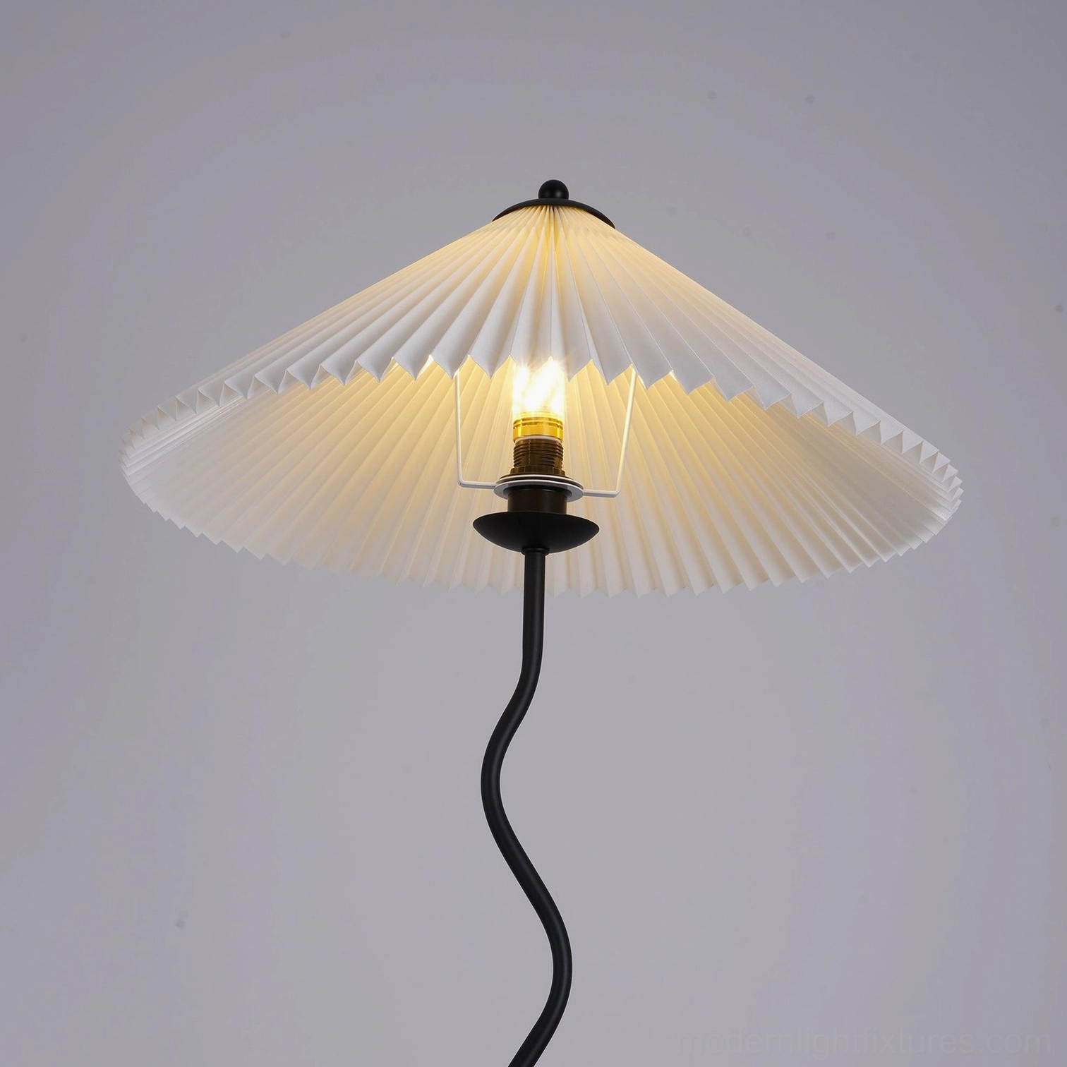 White squiggle wave floor lamp in modern minimalist bedroom interior - clean contemporary lighting design