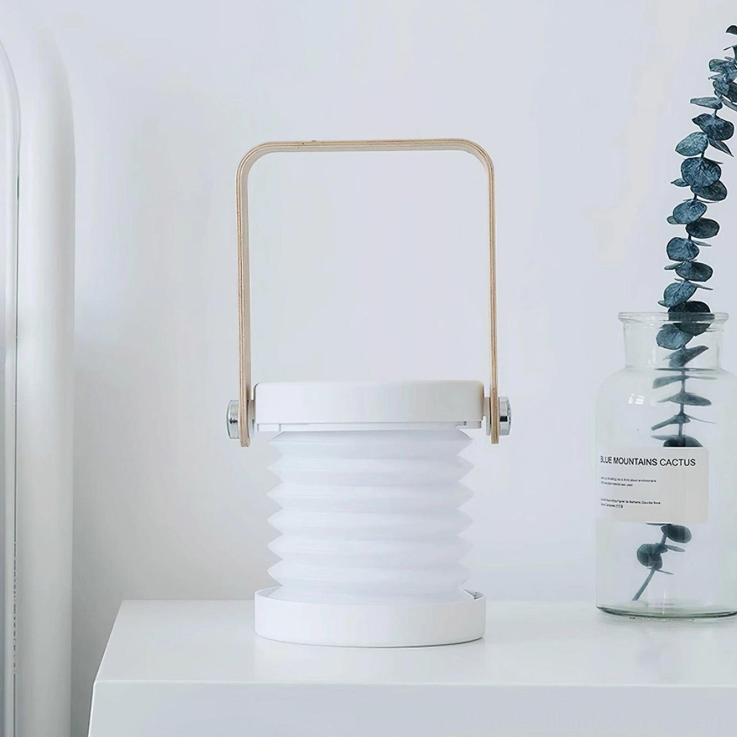 White Terna Portable Table Lamp - Touch-controlled illumination in Scandinavian interior design setting