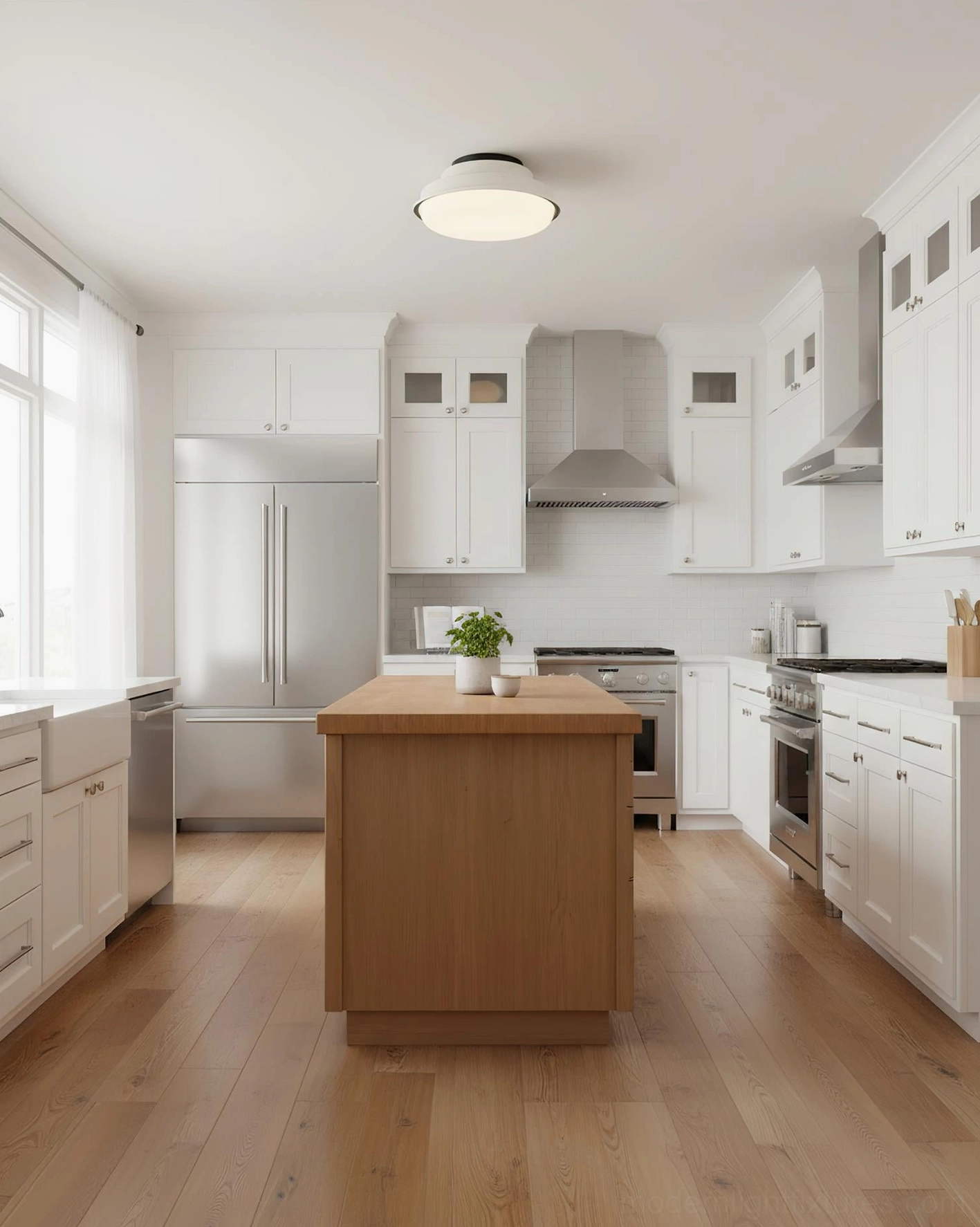 White minimalist round flush mount ceiling lamp in contemporary white kitchen with wooden island countertop