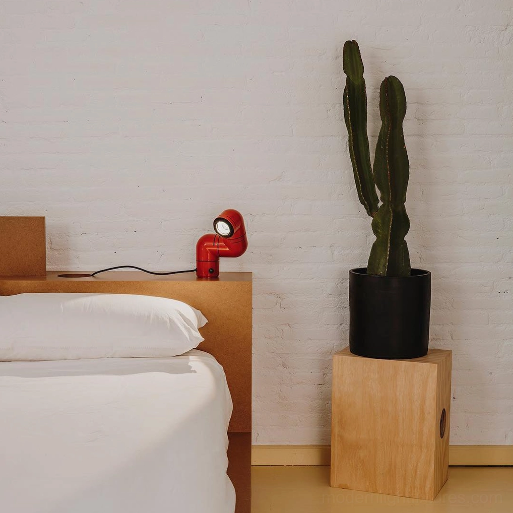 White tubular table lamp Scandinavian design functional form aesthetic quality