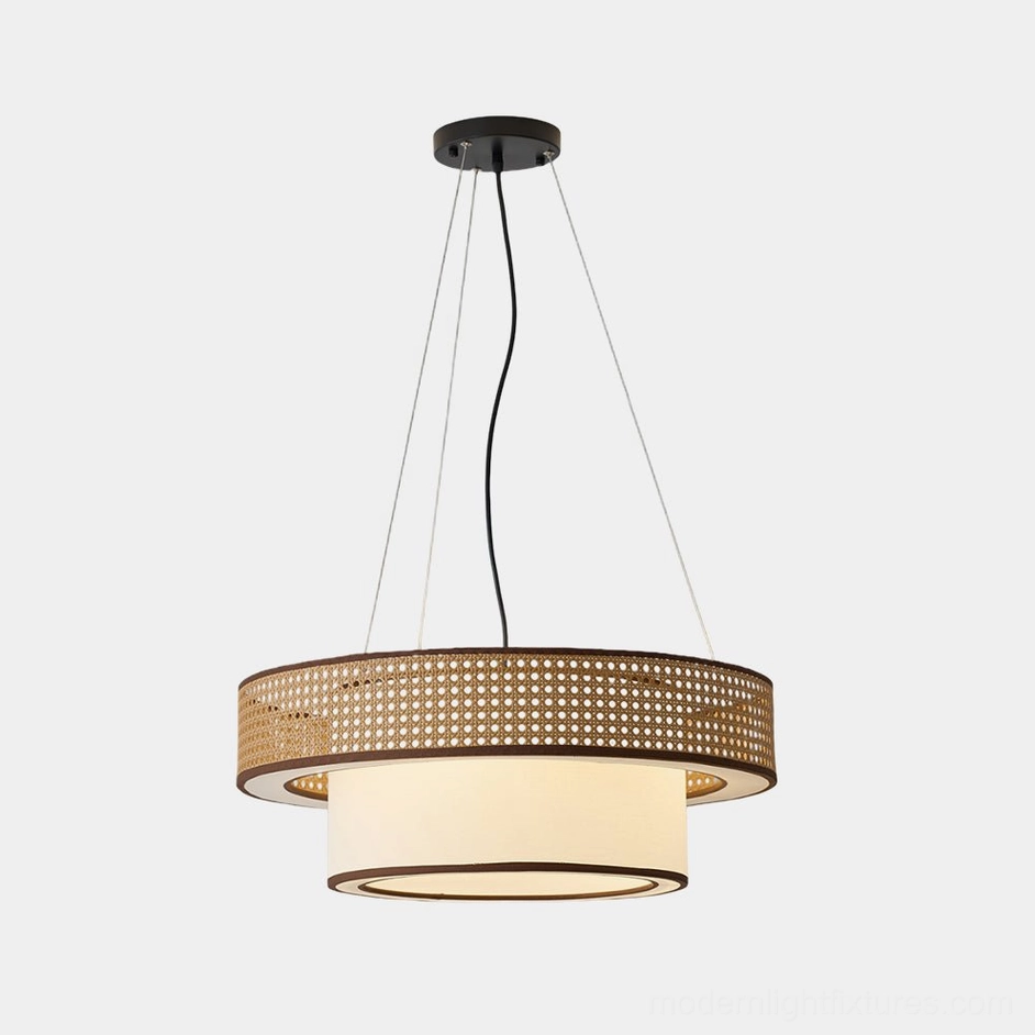 Wicker rattan pendant chandelier with double-ring woven frame shown on white studio background, displaying natural texture and craftsmanship
