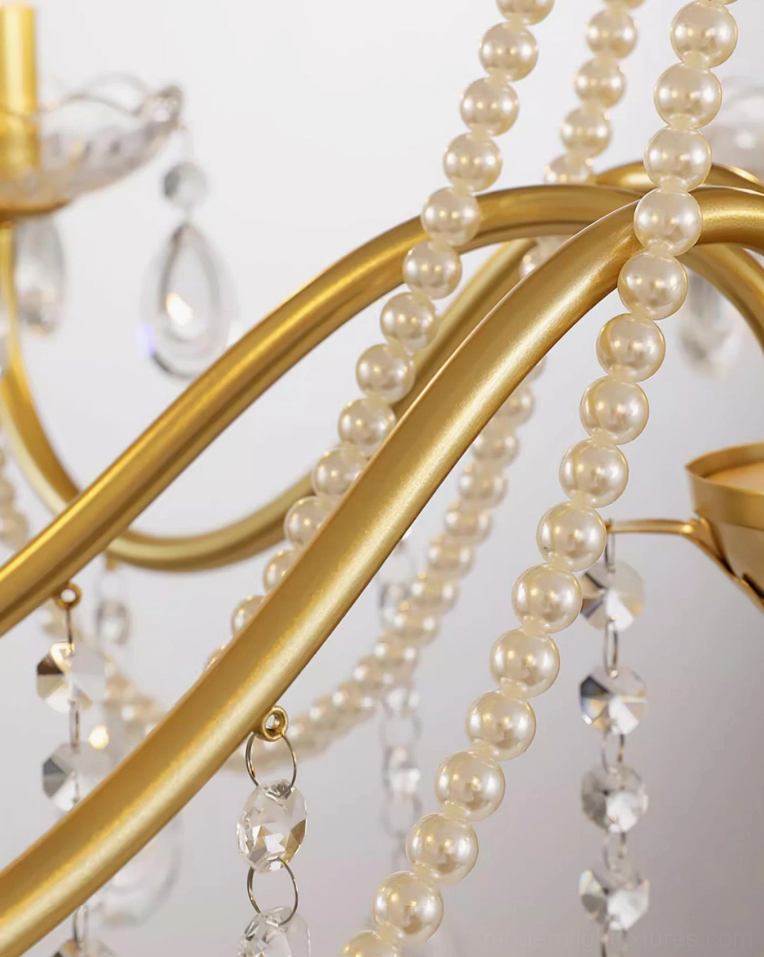 Willa crystal chandelier close-up detail showing hand-crafted clear crystals and gold metal frame construction