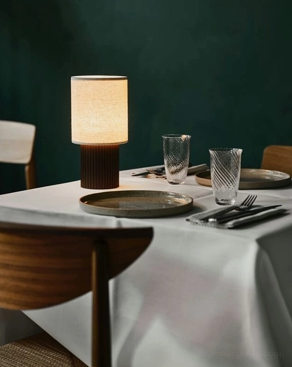 Modern wireless charging table lamp with integrated LED and USB port, professional display setup showing contemporary design versatility