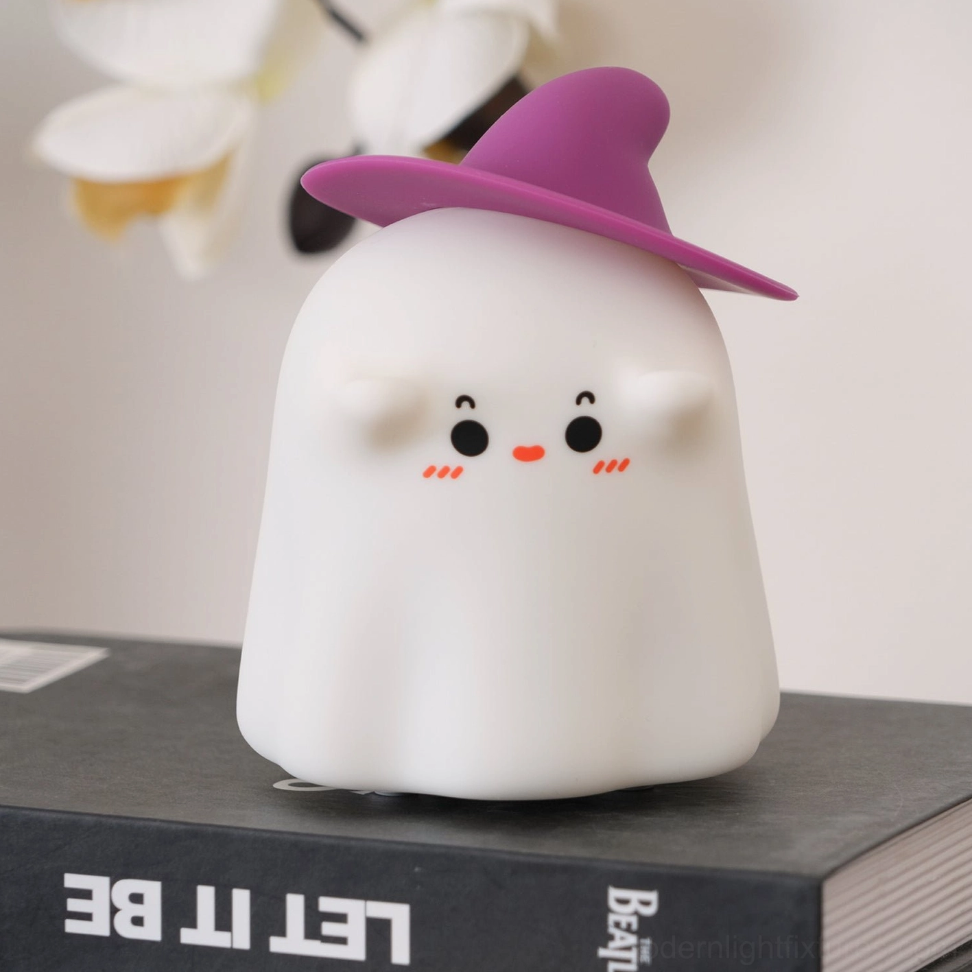 USB Type-C charging port detail on enchanted witch ghost night light base