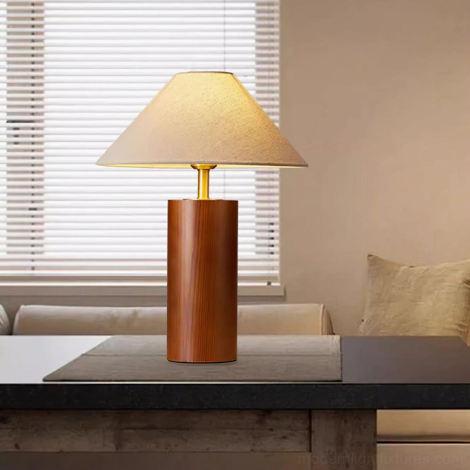 Wooden table lamp with brass accent displayed as decorative accent in modern living space