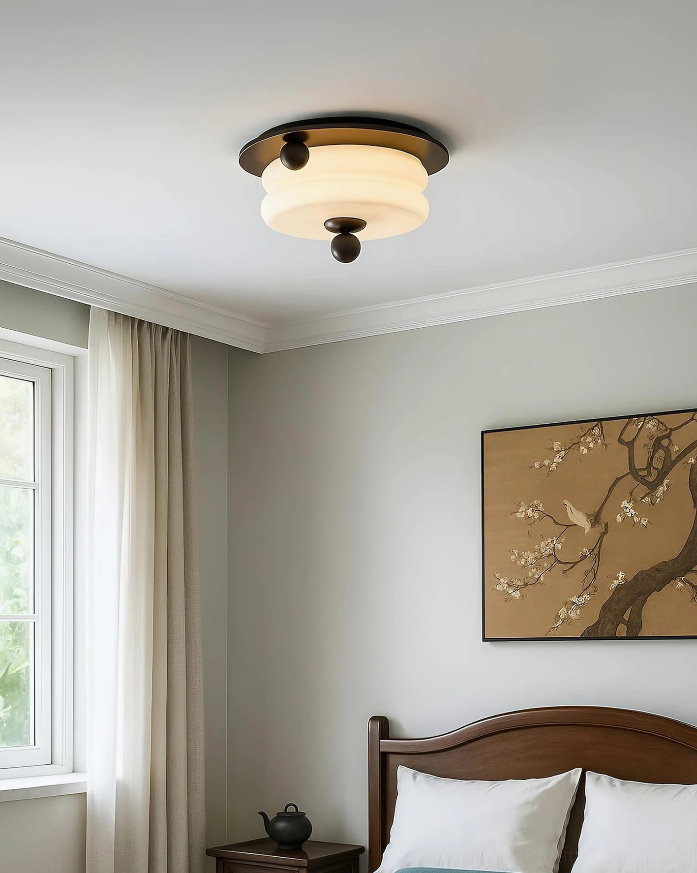 Installed warm LED ceiling light in traditional bedroom with soft golden glow