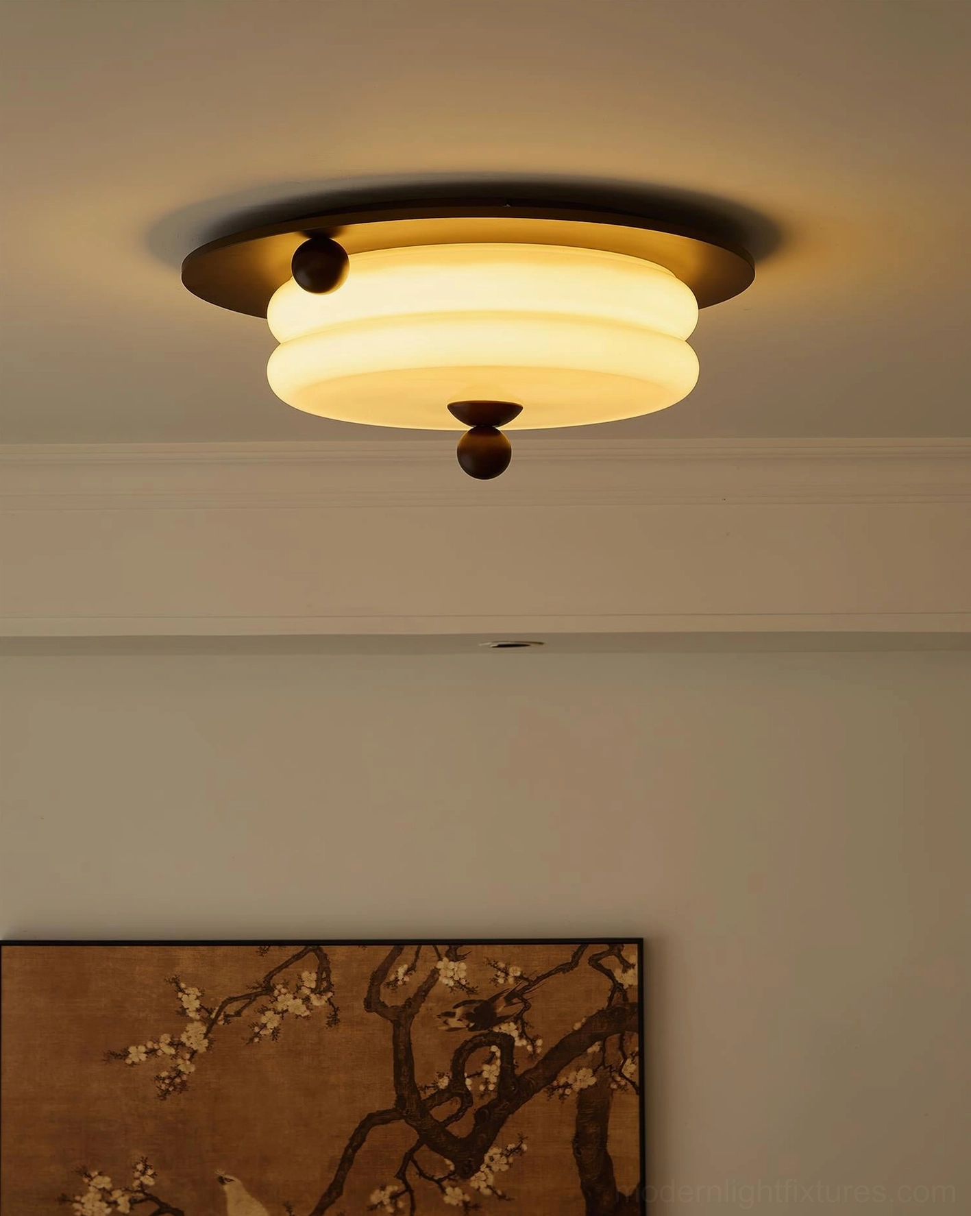 Illuminated wood ceiling light casting warm ambient glow on bedroom ceiling