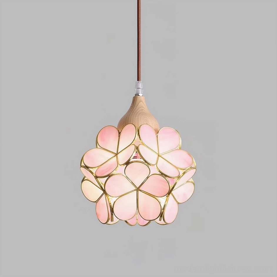 Wood color and pink stained glass flower pendant light, front view showcasing petal structure and natural wood grain
