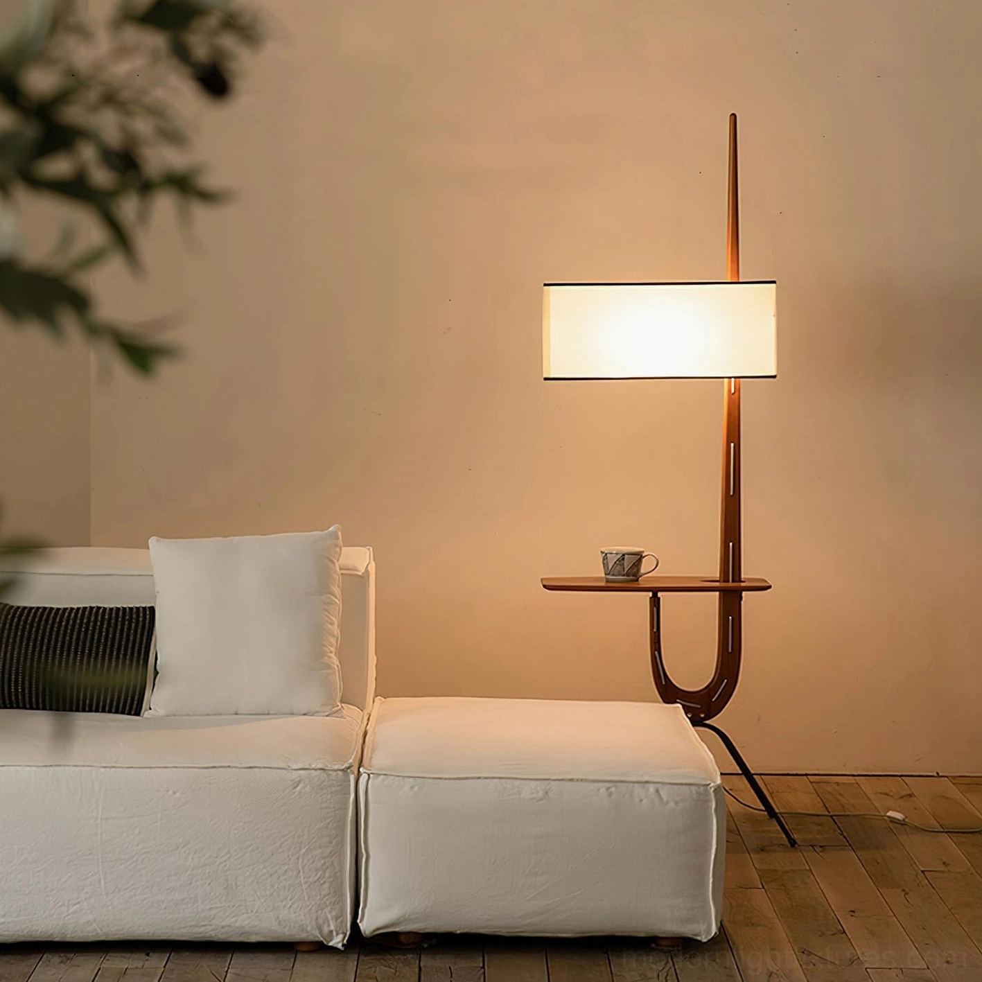 Wood floor lamp with side shelf under warm ambient lighting showing product illumination quality