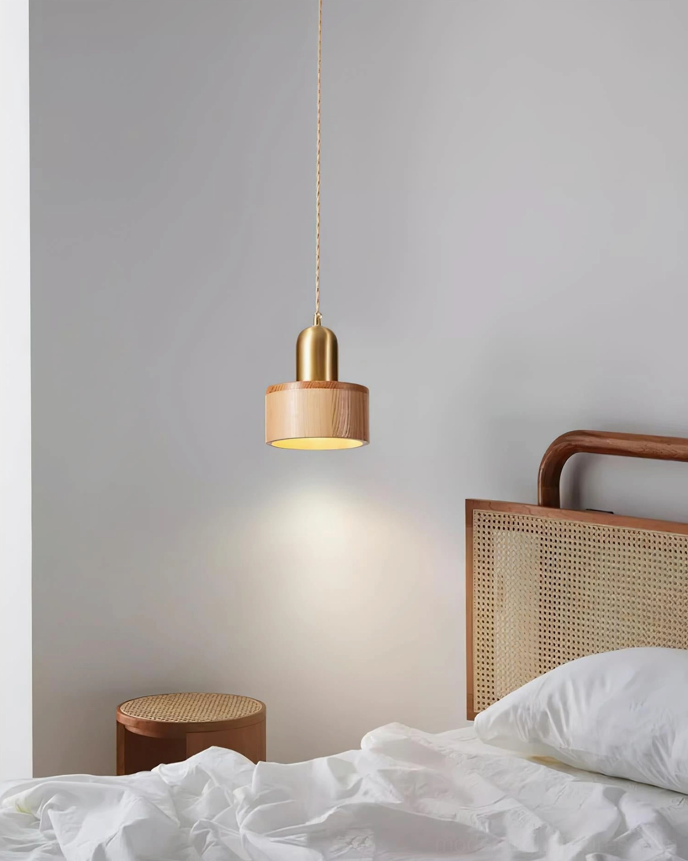 Brass hardware detail on wood pendant light fixture top assembly