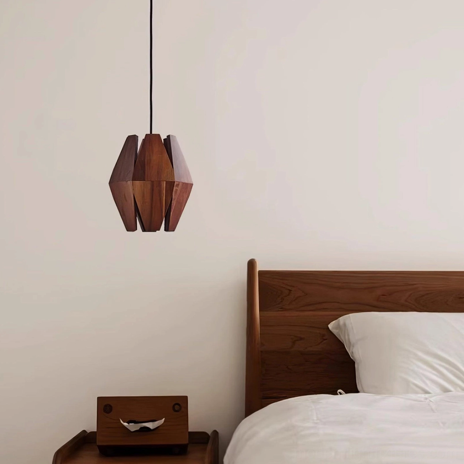 Geometric wood pendant lamp demonstrating light distribution and warm glow characteristics