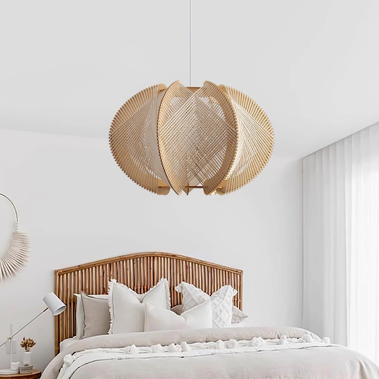 Modern woven wood pendant light hanging in master bedroom above bed with beige bedding