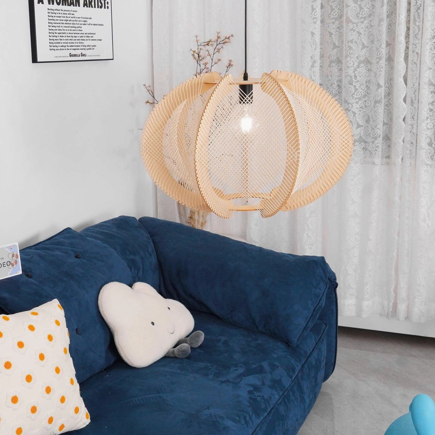 Wood fabric pendant light showing layered construction and geometric design