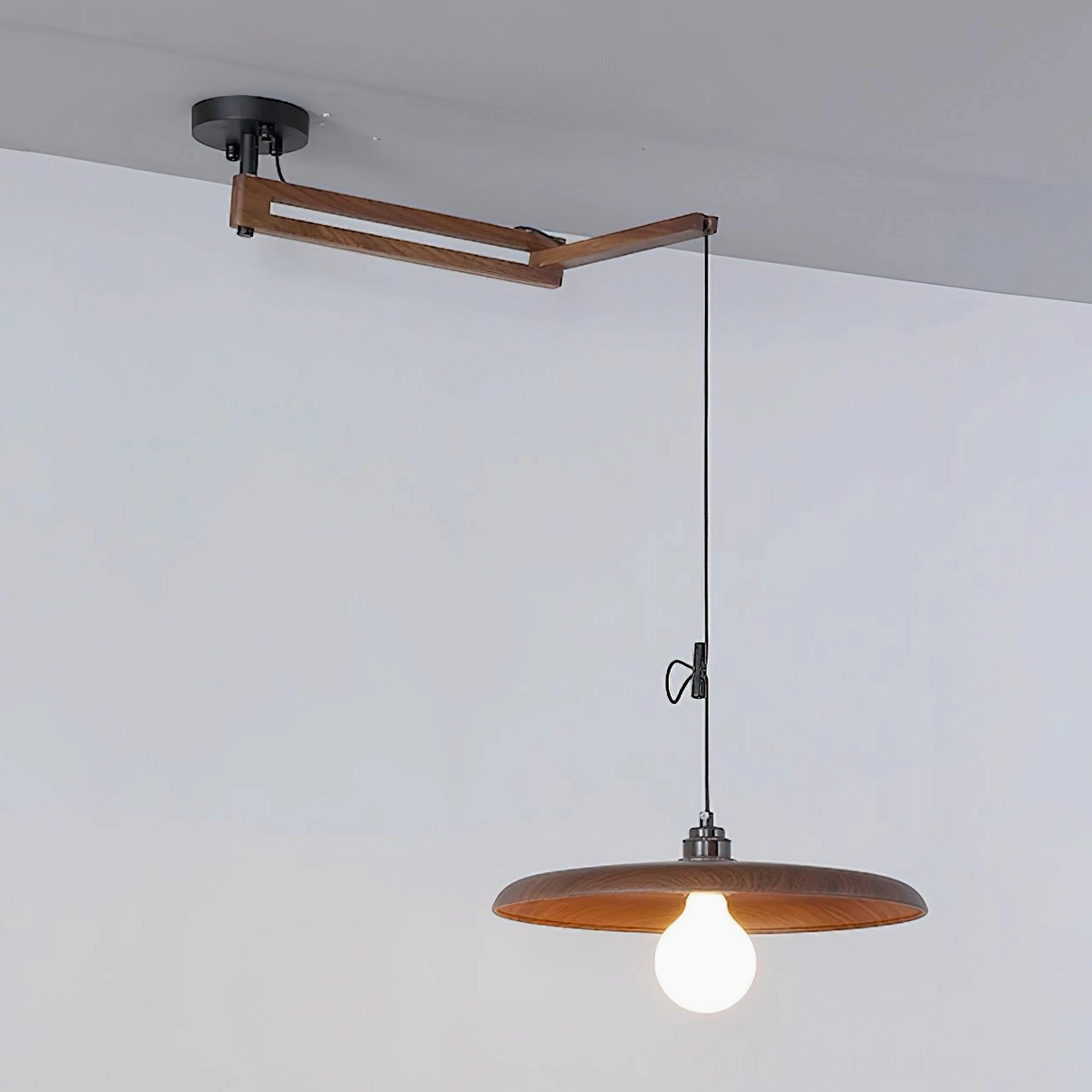 Warm pendant light showing water transfer printed wood shade texture