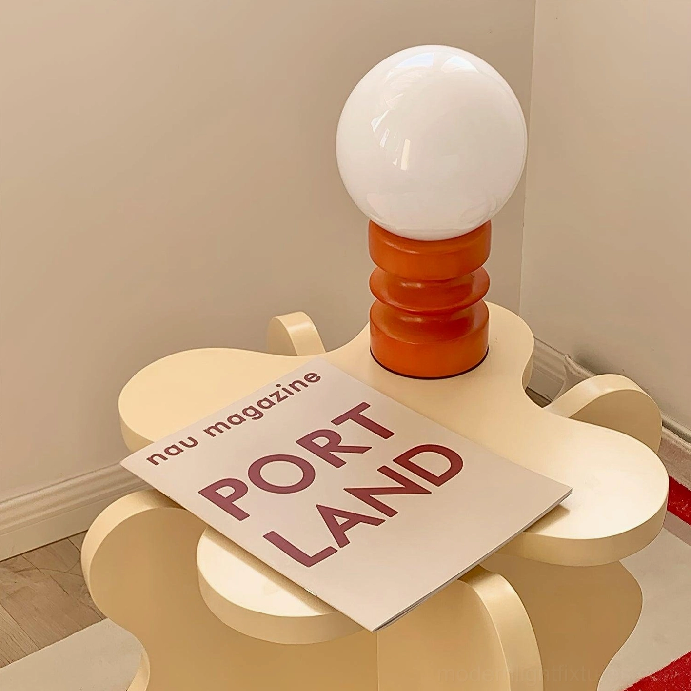 Modern minimalist wood and glass table lamp with warm ambient lighting effect