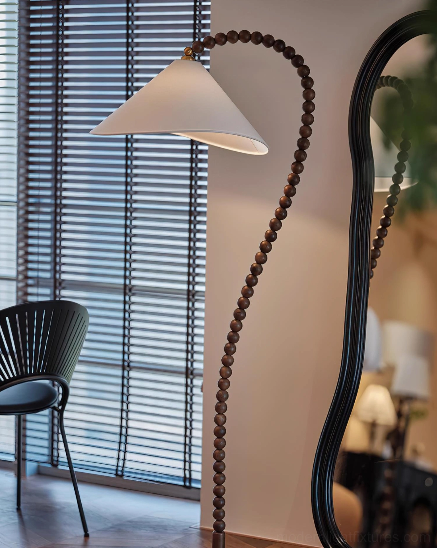 Hand-carved wooden bead floor lamp with white fabric shade - sculptural close-up