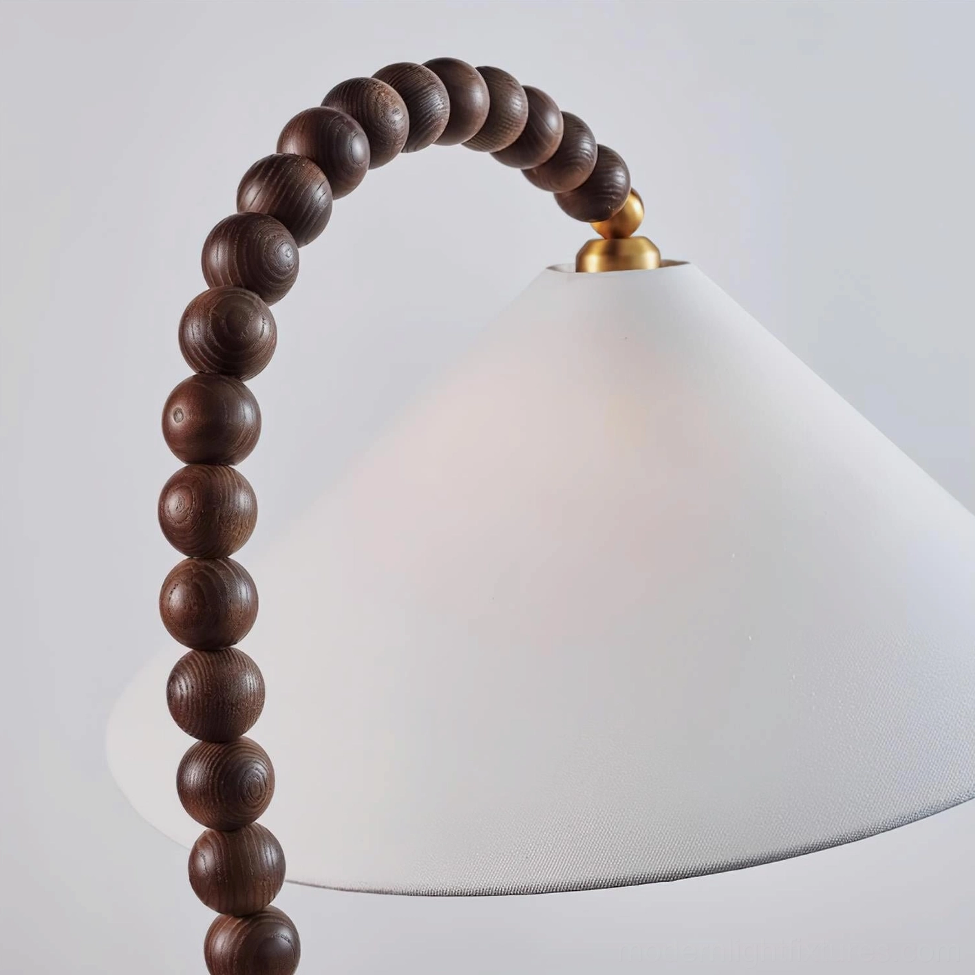 Wooden beaded floor lamp in cozy home interior creating warm inviting ambiance