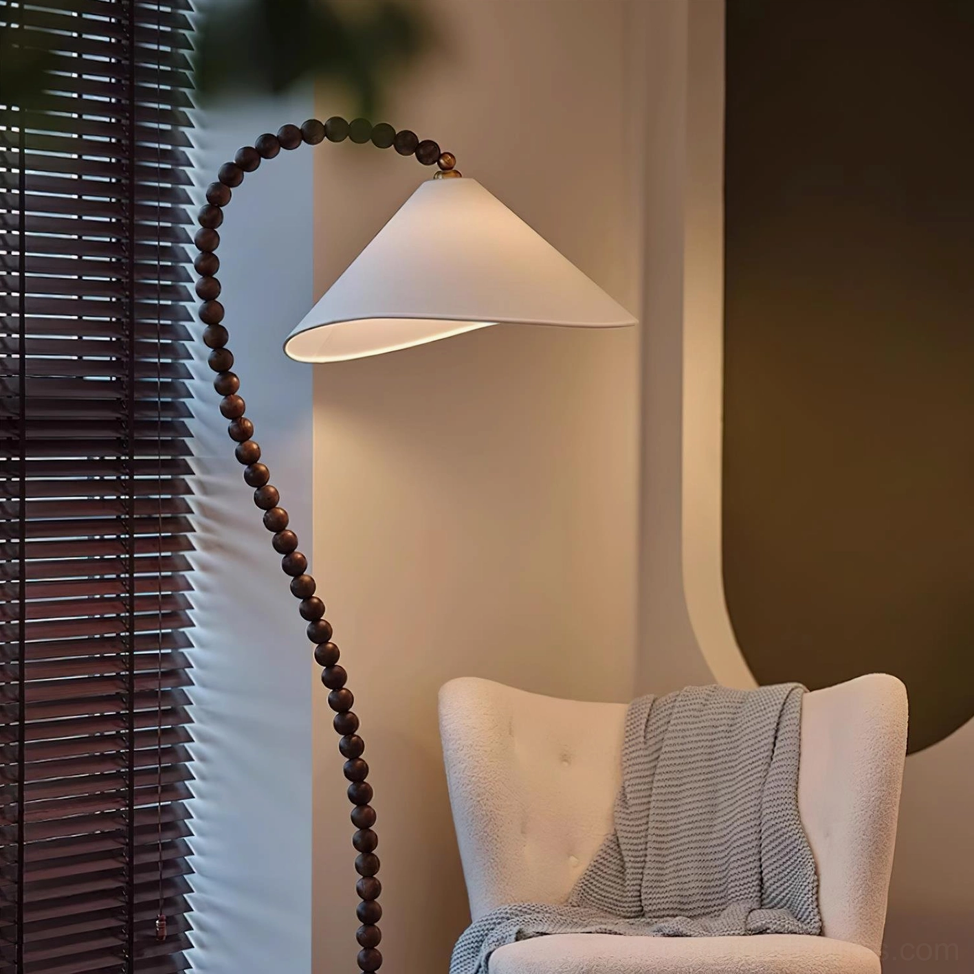 Artisanal wooden bead floor lamp showing natural wood grain and sustainable craftsmanship