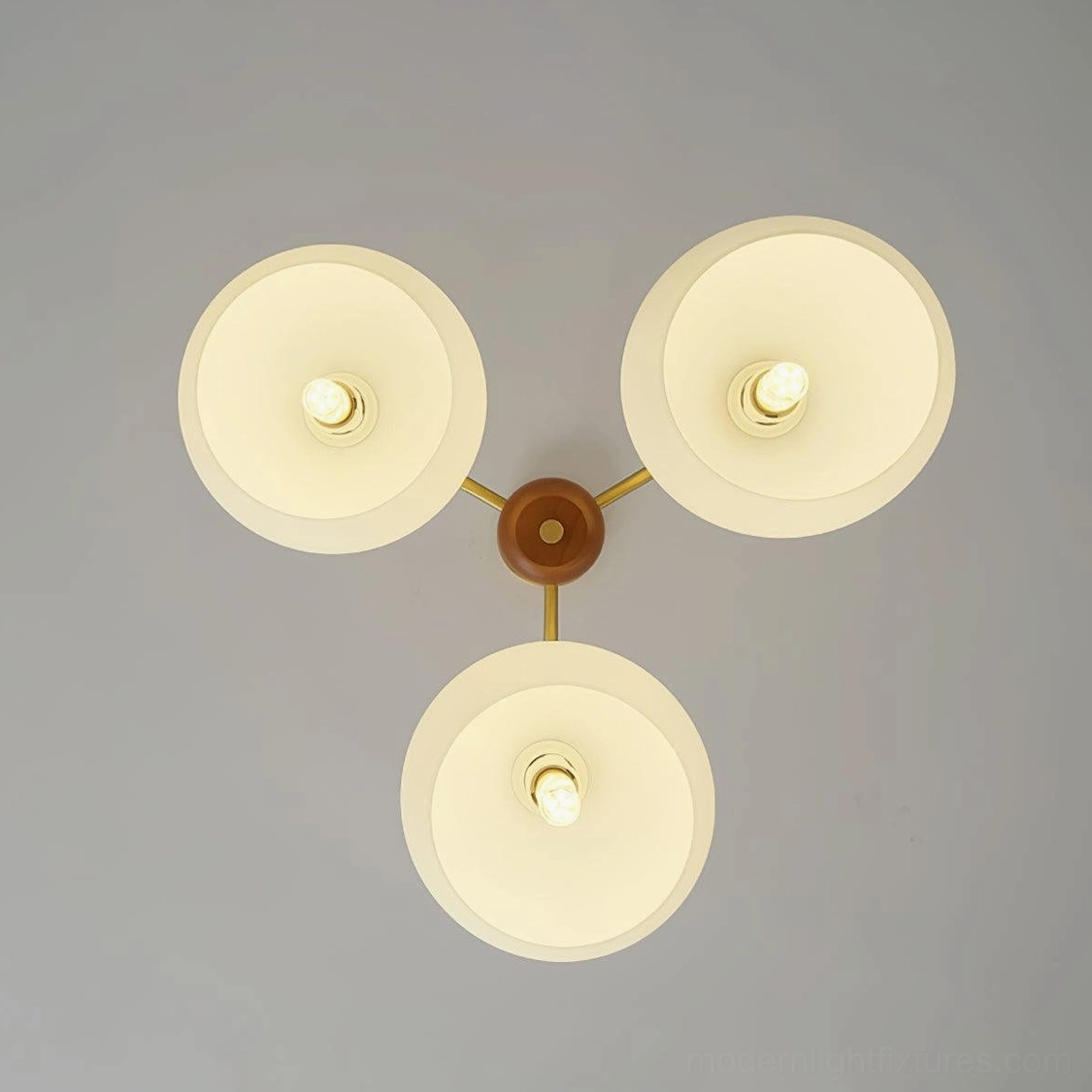 Nordic wooden brass glass chandelier - close-up detail of frosted glass shade and brass hardware